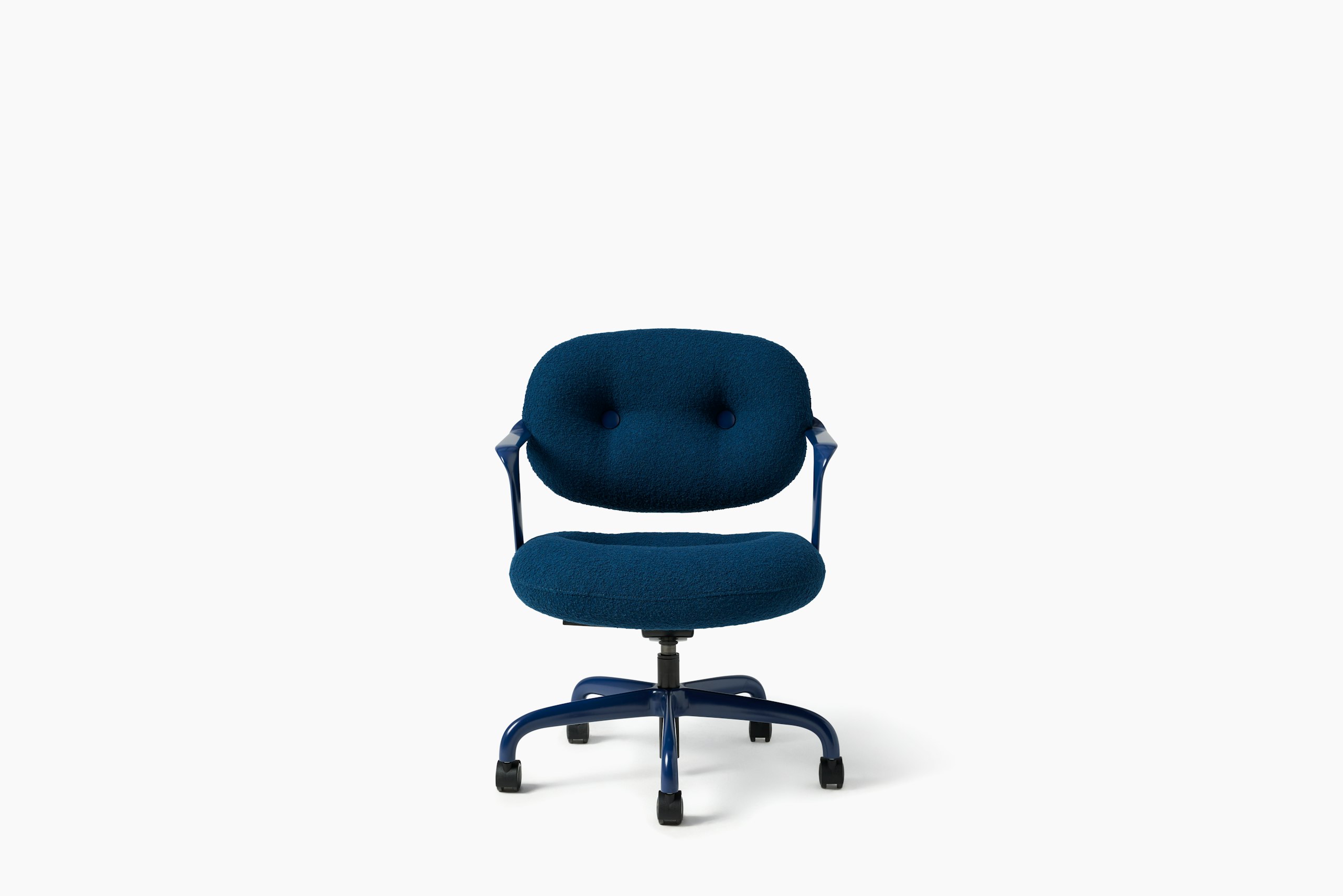 Front view of a Morrison Hannah chair with a blue frame and base with fixed arms and dark blue upholstery.