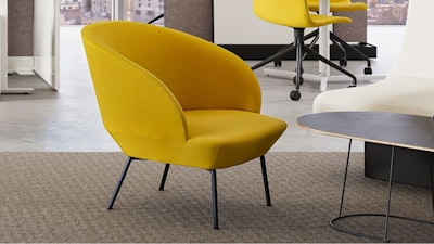 A yellow Muuto Oslo Lounge Chair and white NaughtOne Rhyme Seating System in a team neighborhood setting designed to facilitate connection and collaboration