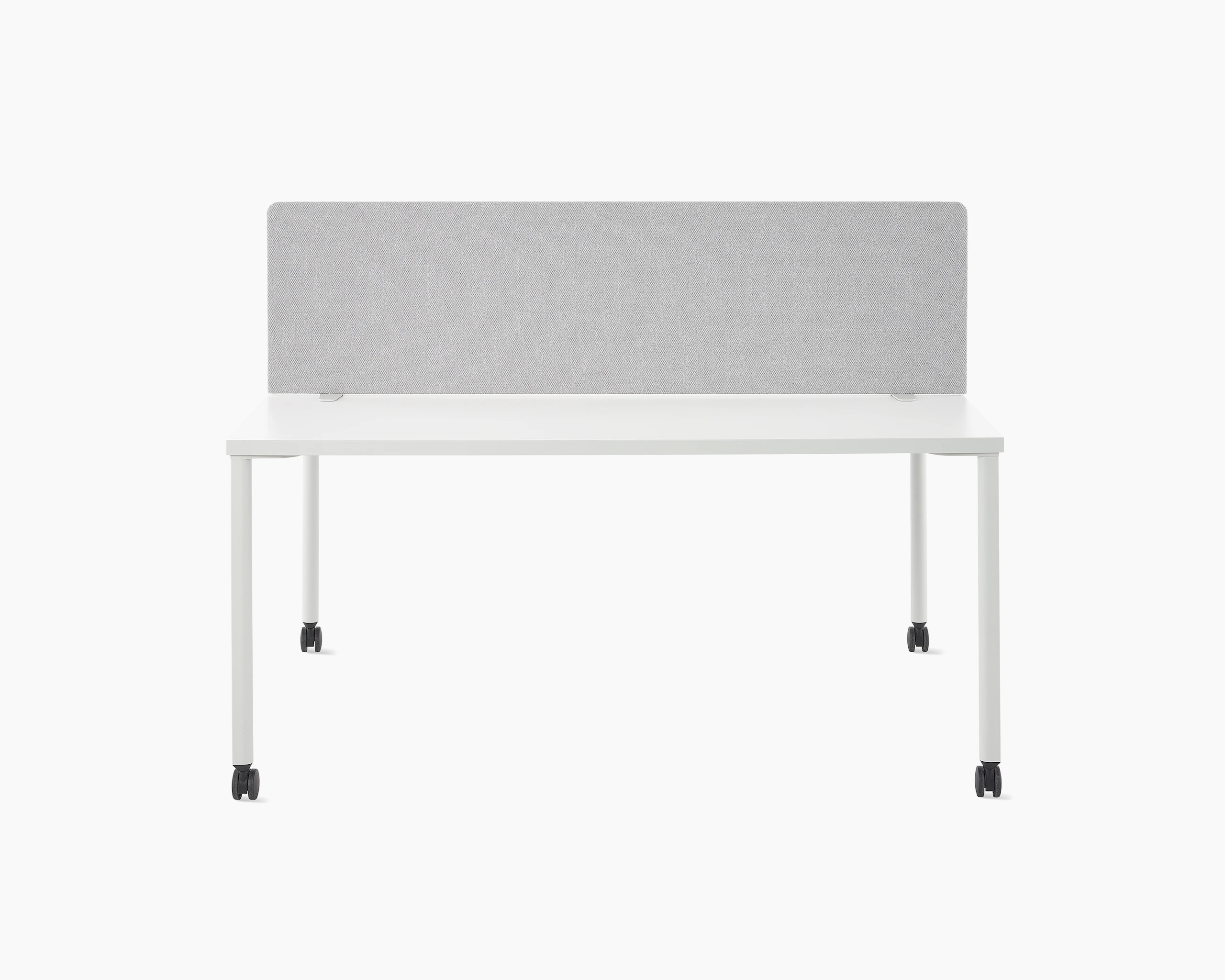 A grey OE1 Movable Screen on a white OE1 Project Table, viewed from the front.
