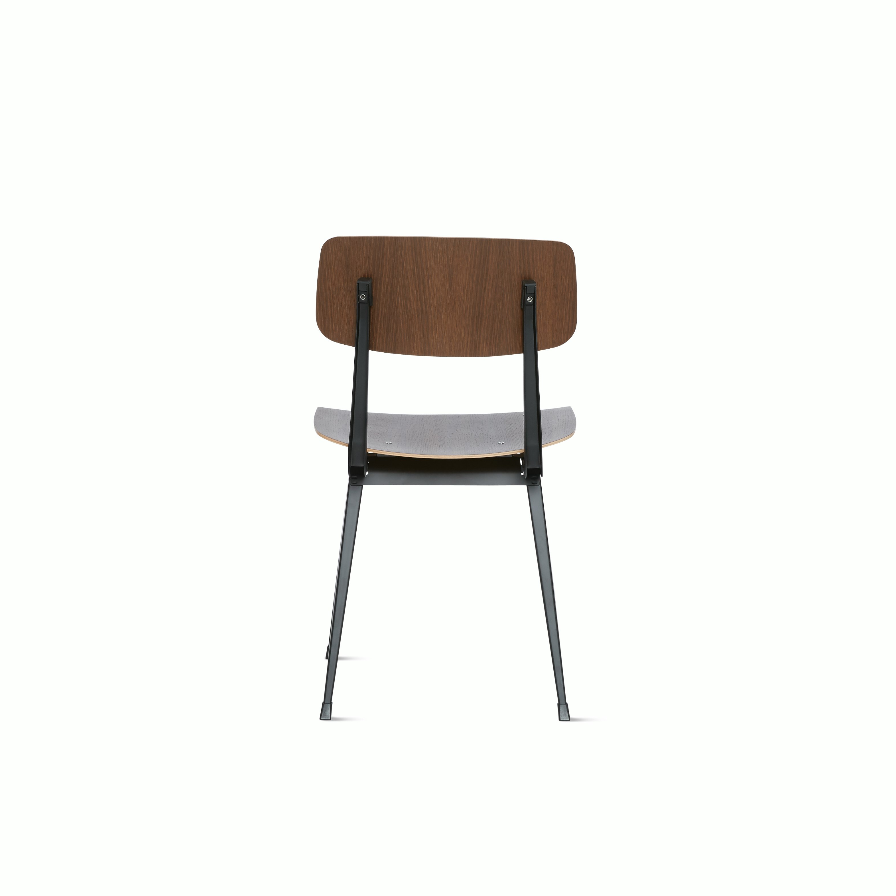 A smoke lacquered oak Result Chair with black base viewed from the back