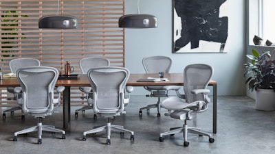 Six Aeron Chairs around a large conference table.