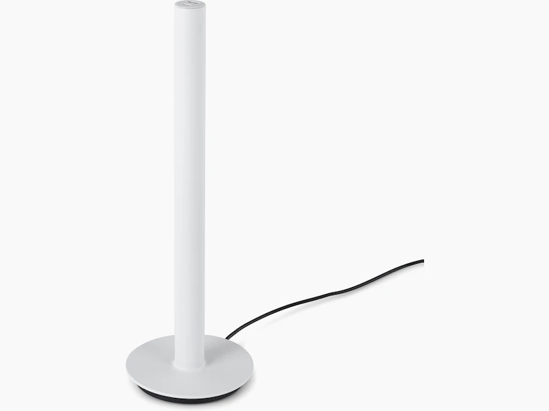 A white Logic Micro Tower with a charging cord.