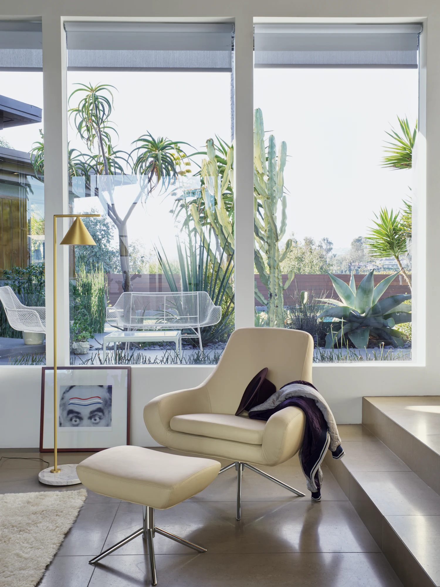 Noomi ottoman styled in an interior setting with plants