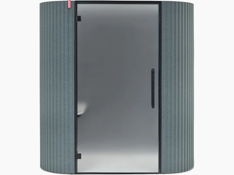 A front view of a Bay Work Pod Pro with a frosted door and a lit occupancy indicator.