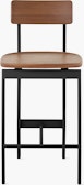 An walnut counter height Betwixt Stool with a black frame.
