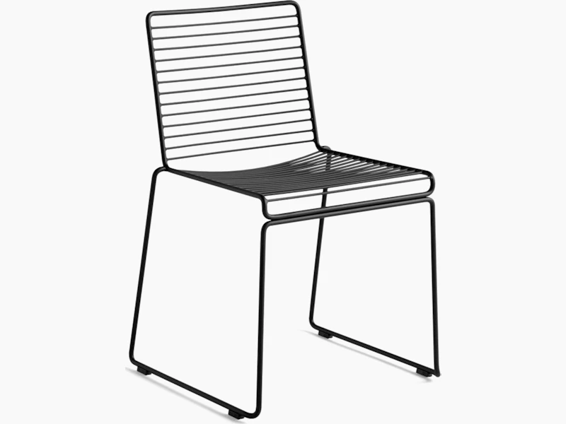 A front angle view of the Hee Dining Chair in black.