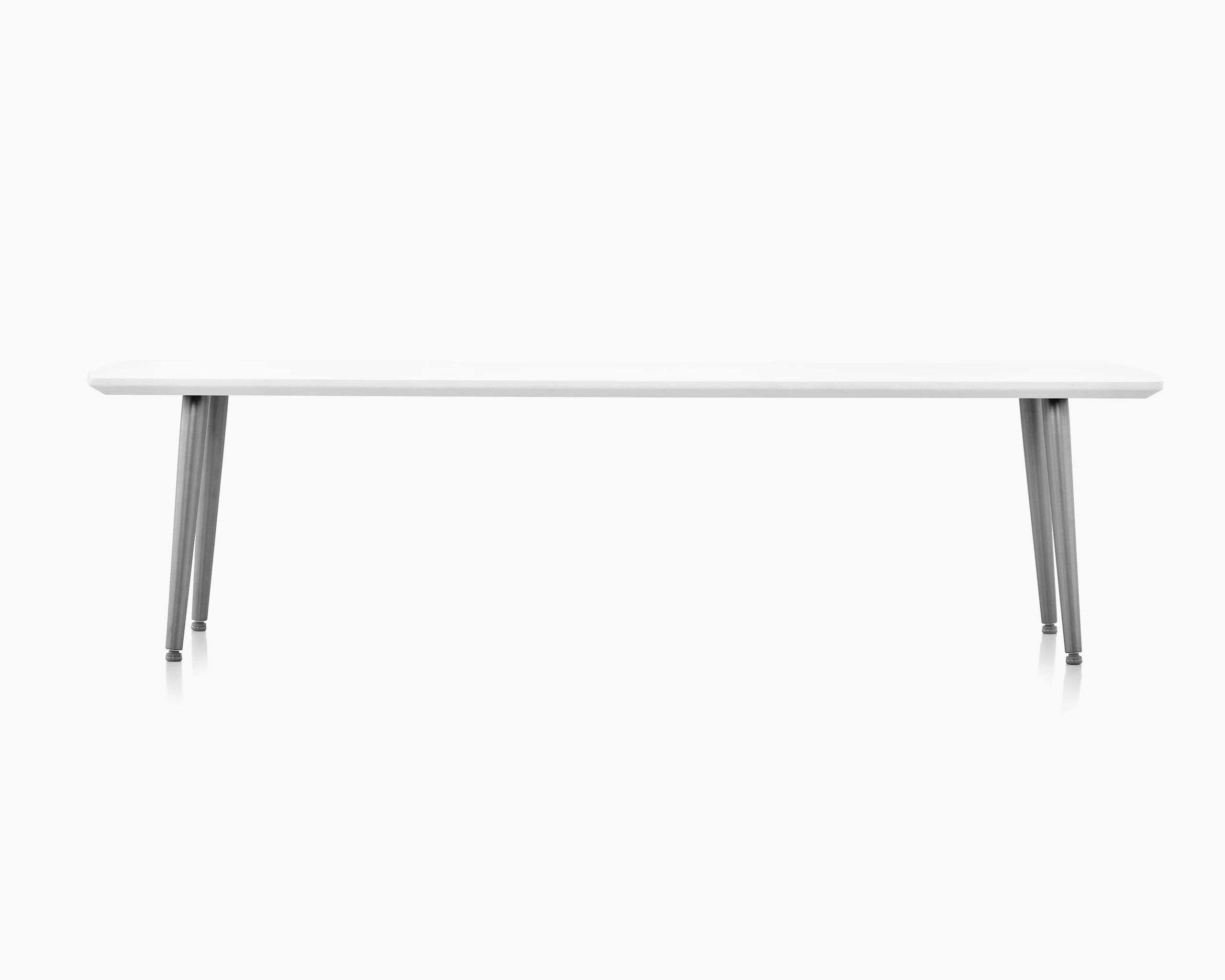 Palisade Occasional Table with metal legs and solid surface top on white sweep.