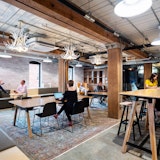 Rockwell Unscripted | 1717 Innovation Center rockwell unscripted sawhorse table tall table easy stools steps coworking space touchdown space