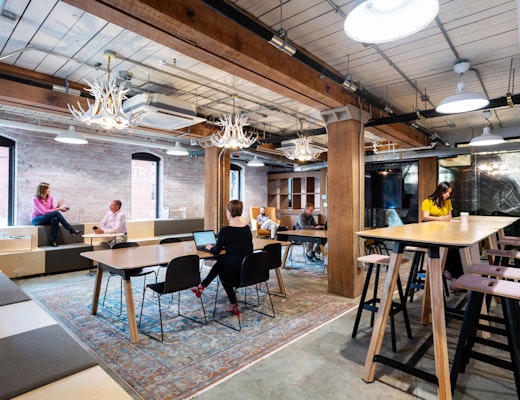 Rockwell Unscripted | 1717 Innovation Center rockwell unscripted sawhorse table tall table easy stools steps coworking space touchdown space