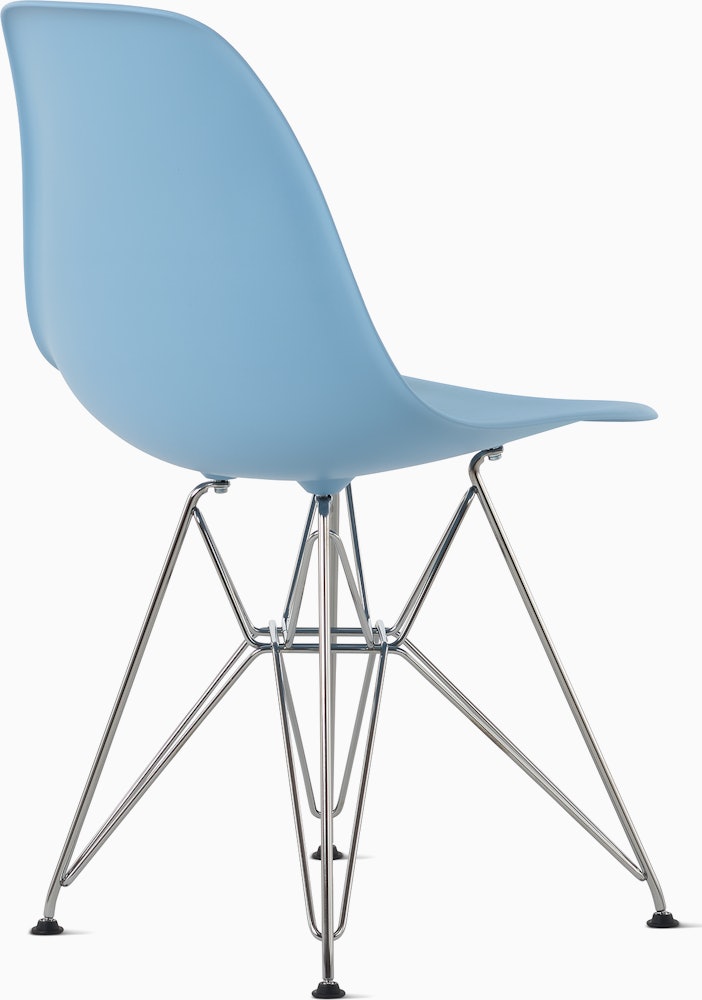 Back angle of pale blue plastic shell chair with wire base legs.