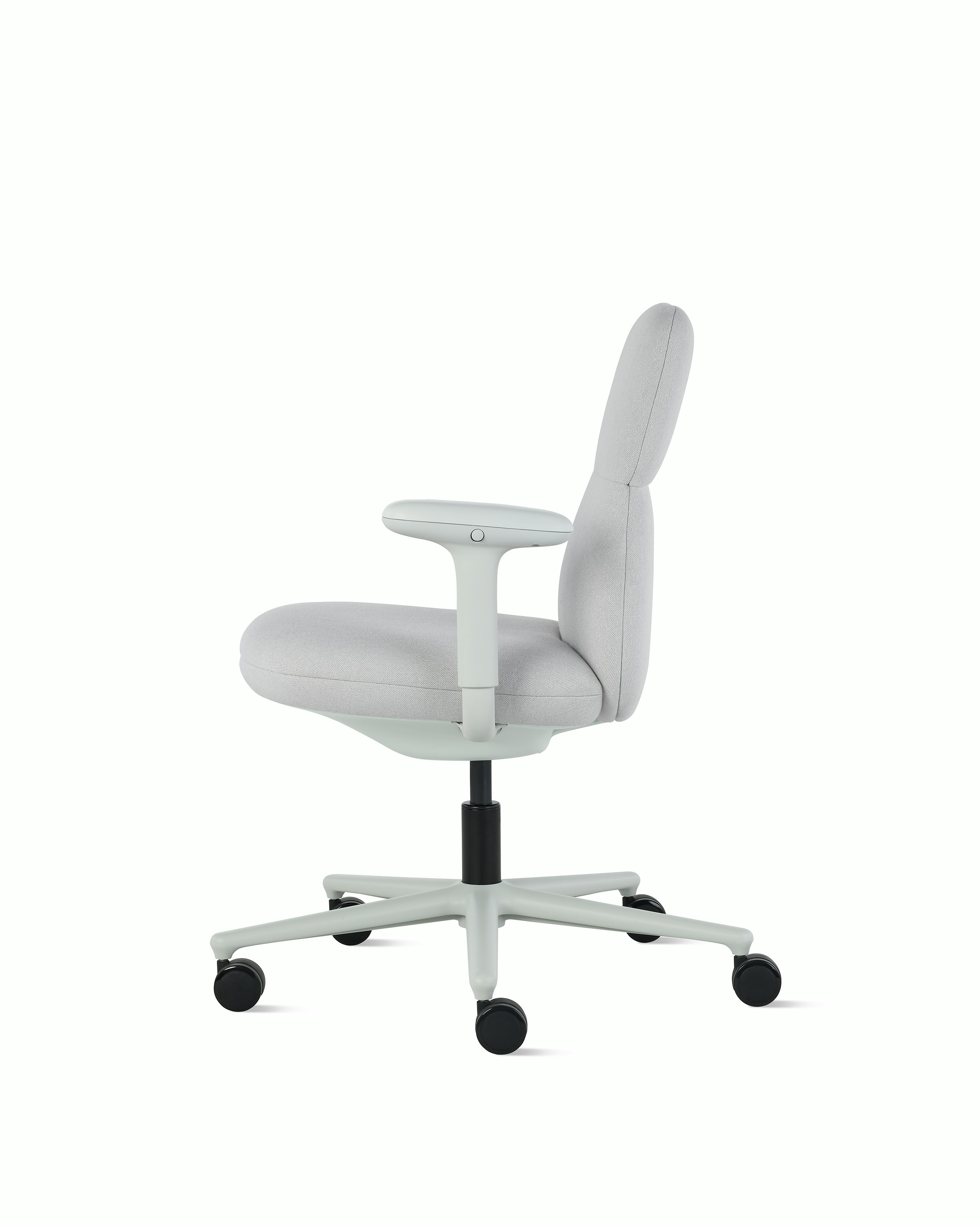 Side view of a mid-back Asari chair by Herman Miller in light grey with height adjustable arms.