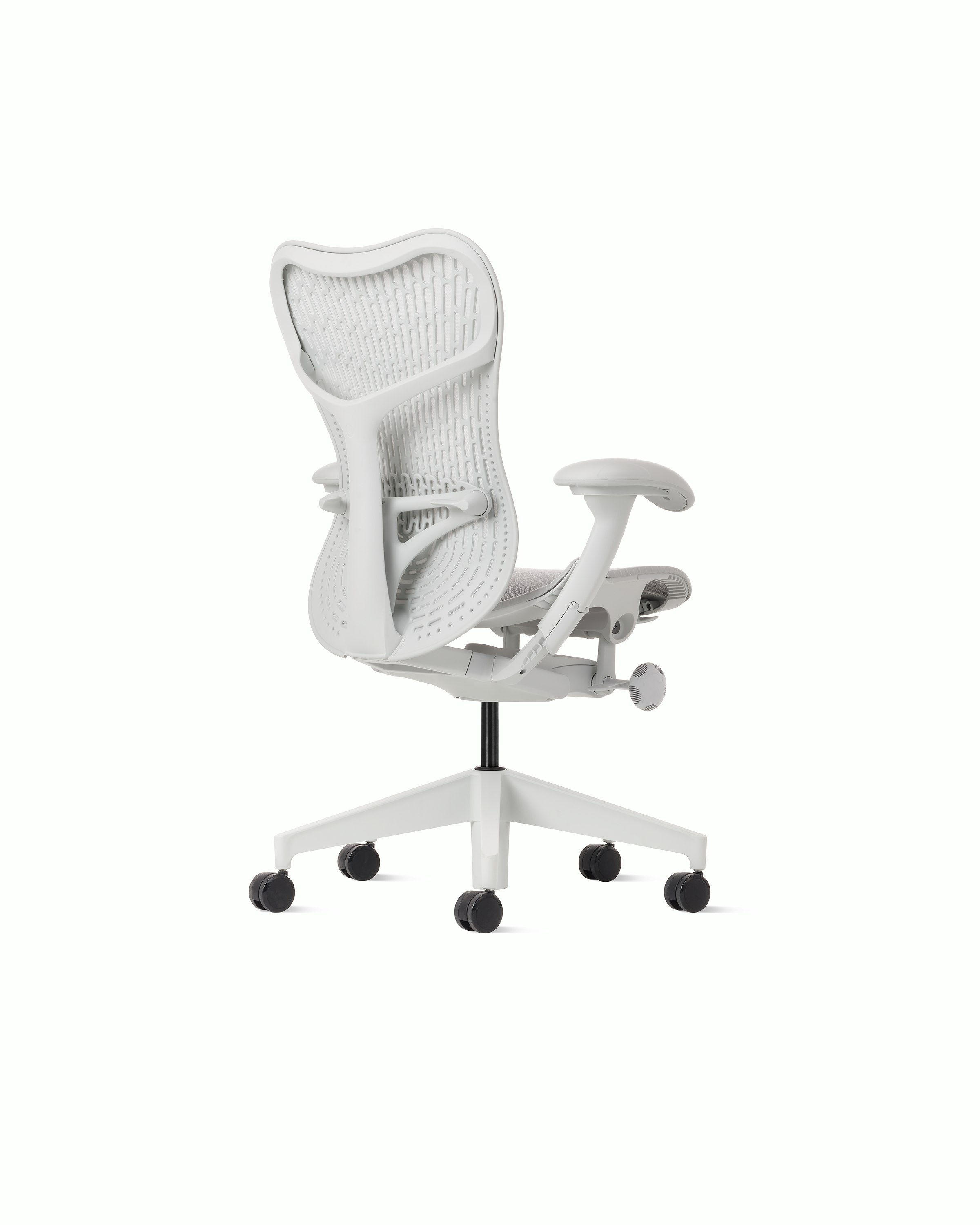 Rear angle view of a Mirra 2 chair with a Butterfly back in alpine.