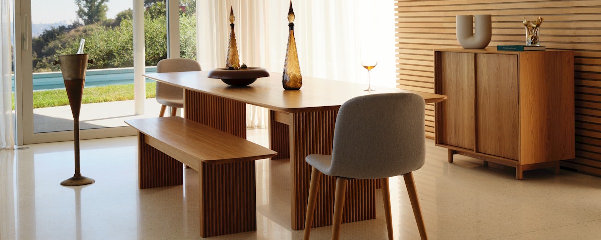 Ten Bench, Ten Table, and Bacco Side Chair in a dining room setting