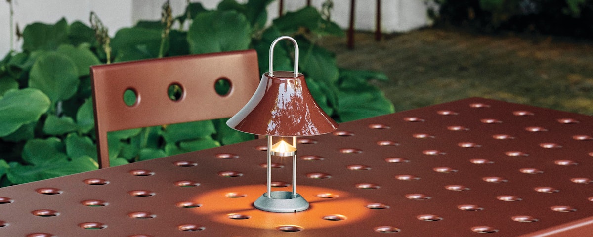 Mousqueton Portable Outdoor Lamp with Balcony Outdoor Dining Table and Chairs in outdoor setting