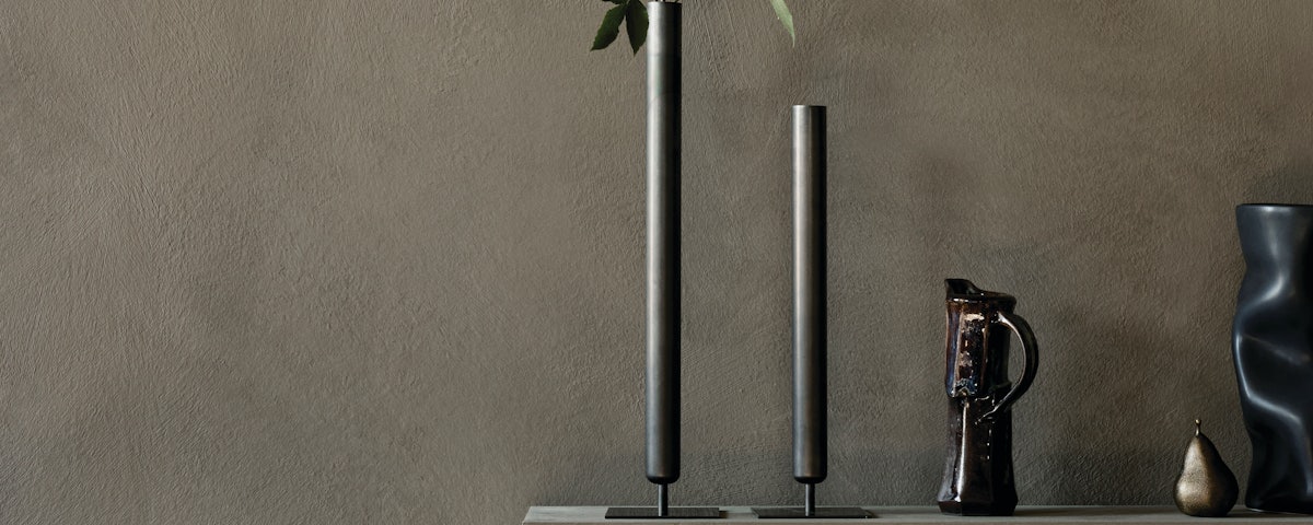 Stance Vases on a fireplace mantle