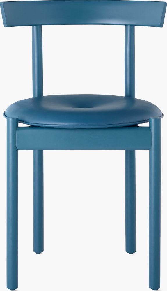 A blue Comma Chair with a seat pad, viewed from the front.