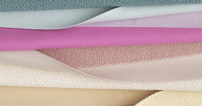 A multi-colored stack of textiles from Maharam