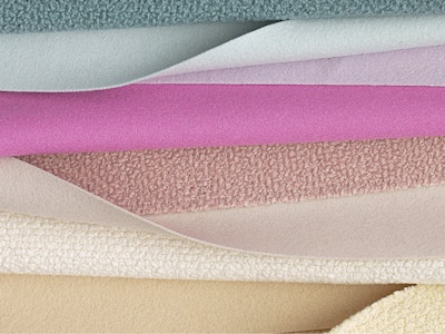 A multi-colored stack of textiles from Maharam