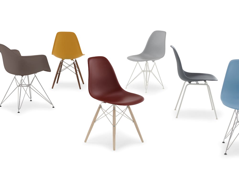 Group of Eames Molded Plastic Shell Chairs included blue green shell on wire base, grey green shell on wire base, cocoa armchair shell on wire base, deep yellow on dowels, brick red on dowels, light grey shell on wire, medium grey shell on 4 legs, pale blue on wire base, and evergreen molded armchair on wire base.