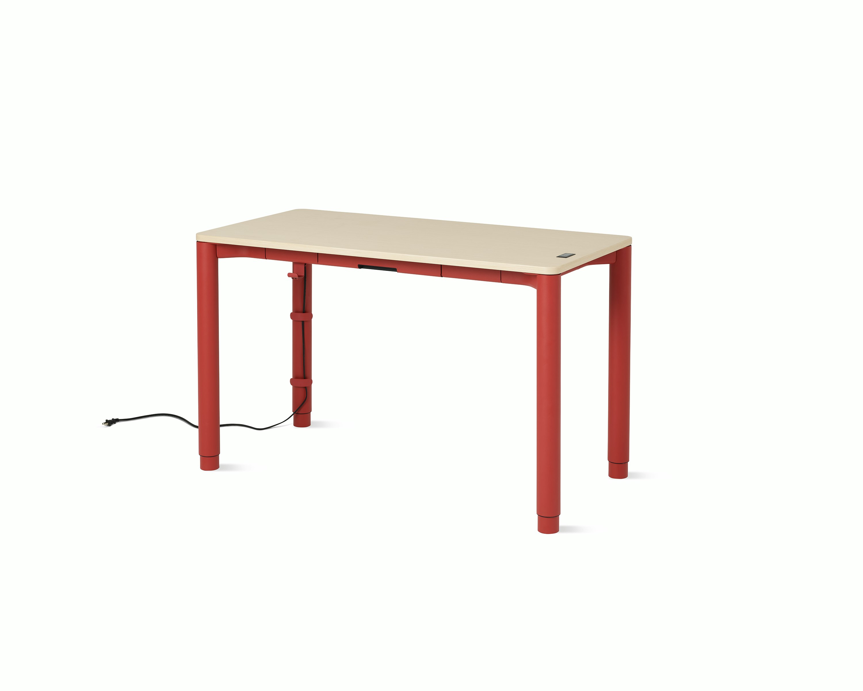 Angle view of a four leg height-adjustable table shown with a light woodgrain surface and red legs.