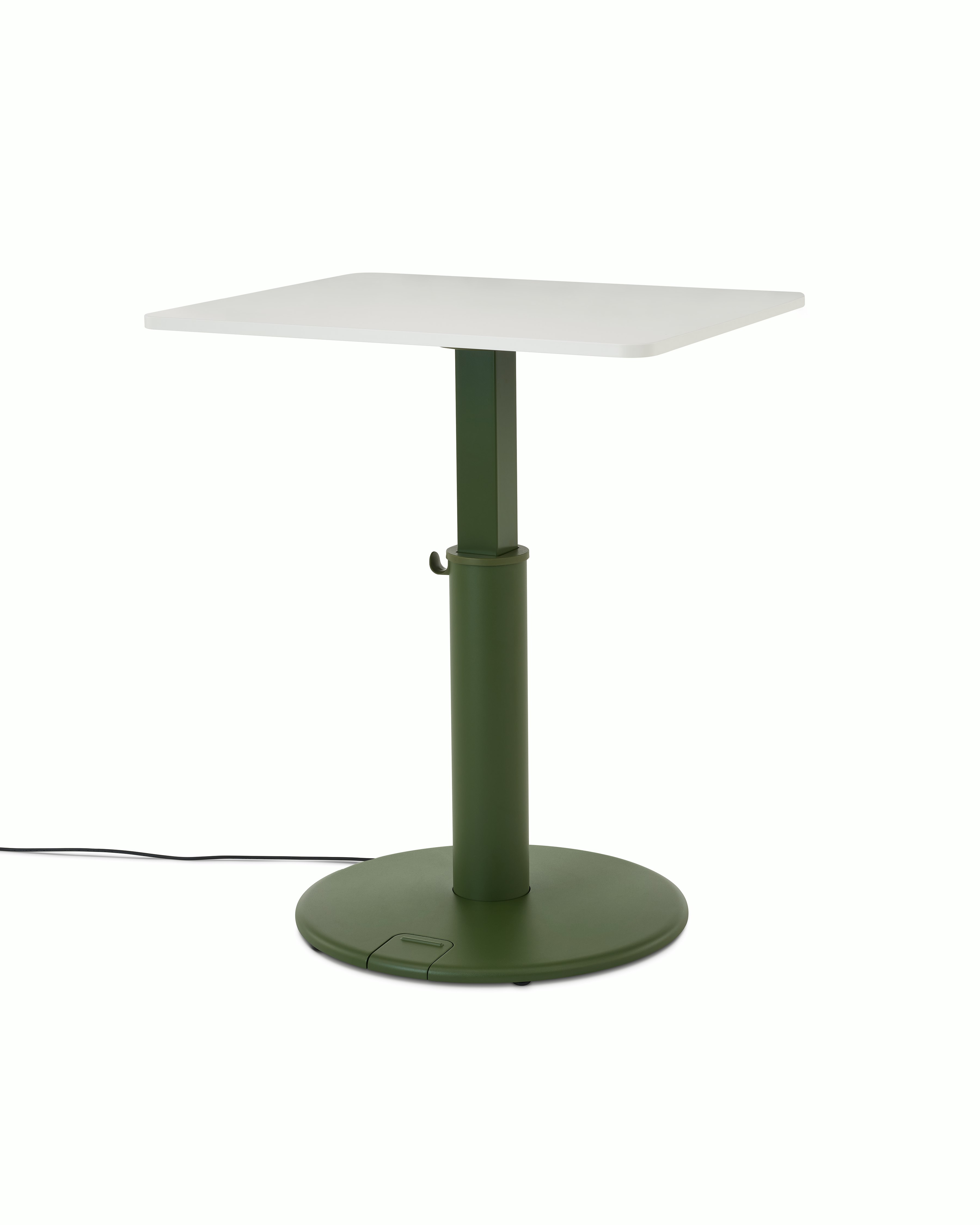 OE1 Sit-to-Stand Table at a standing height with green base and white rectangular surface viewed from a front angle. 