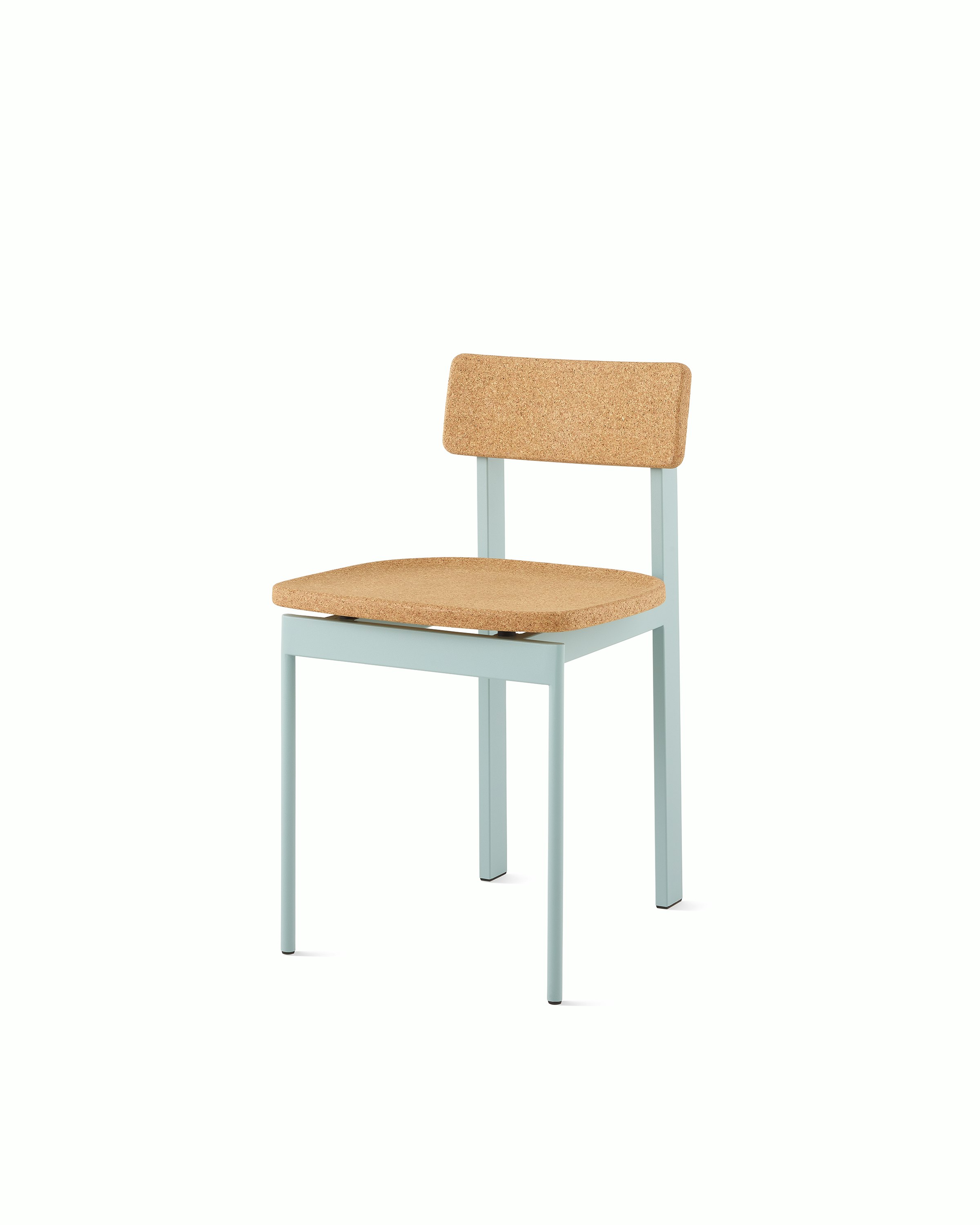 A Betwixt Chair with a cork seat and backrest with a glacier frame. 