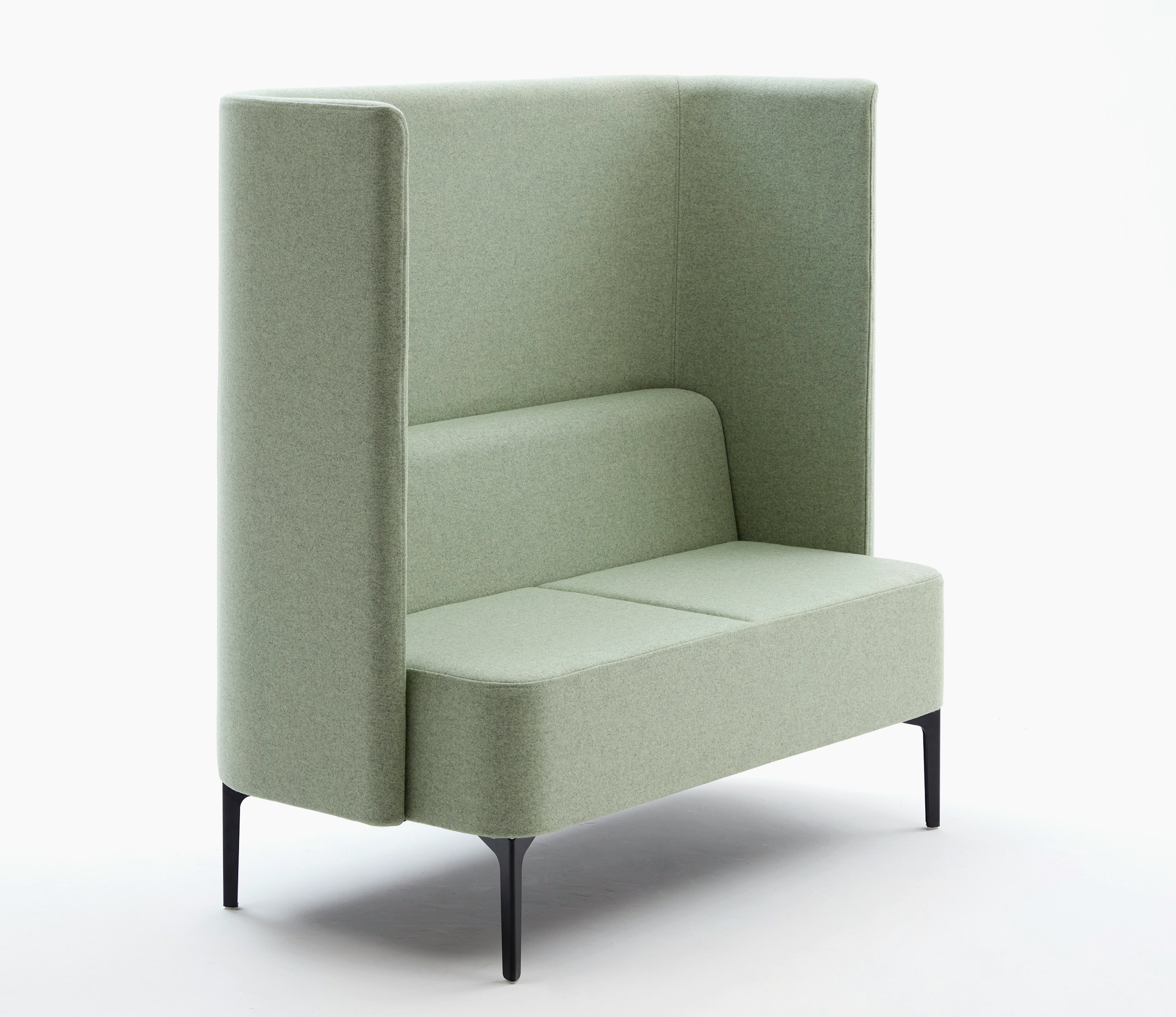 2 seat Pullman Sofa upholstered in pale green fabric, with black steel legs.