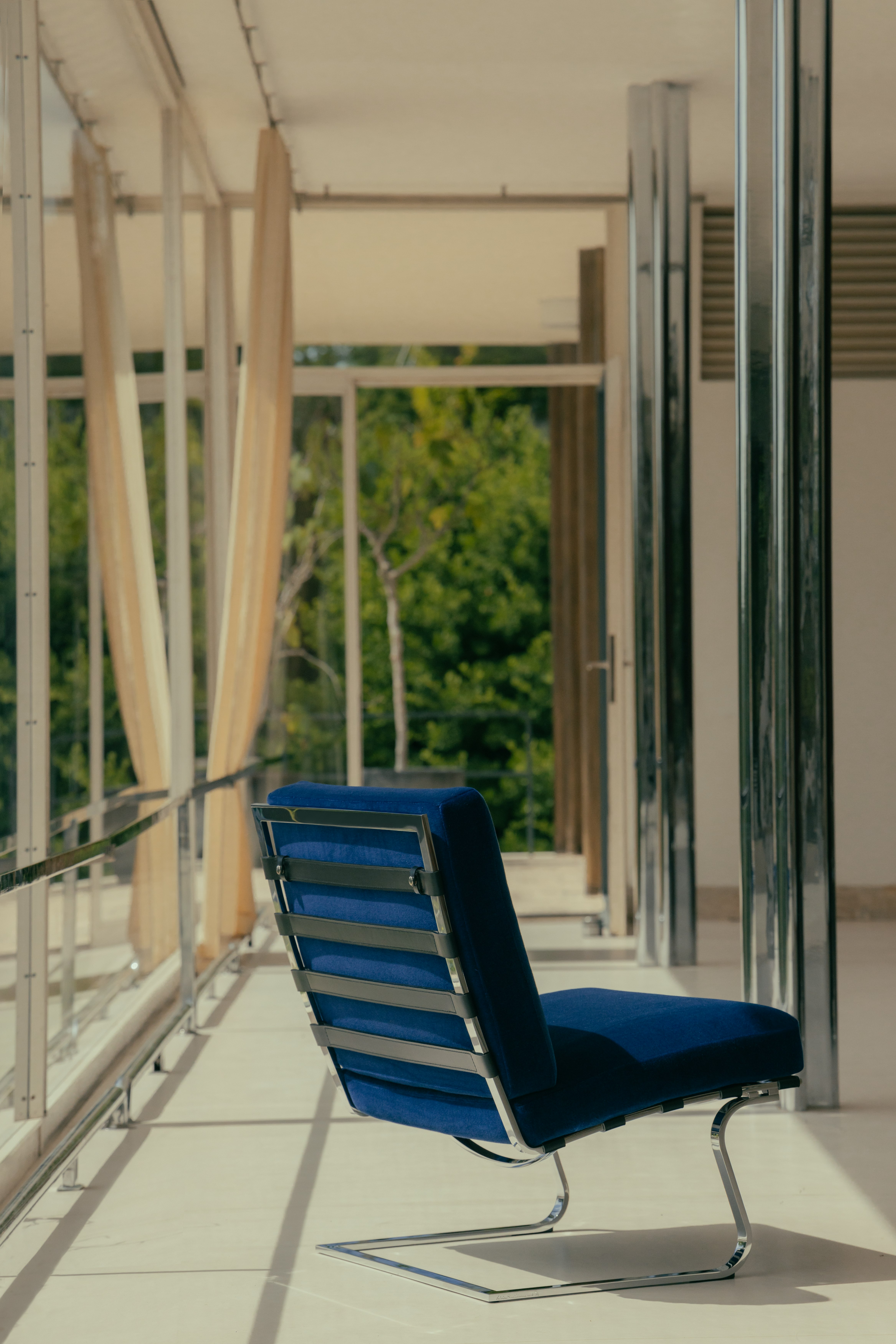 Tugendhat Chair in blue velvet with black base at Villa Tugendhat.
