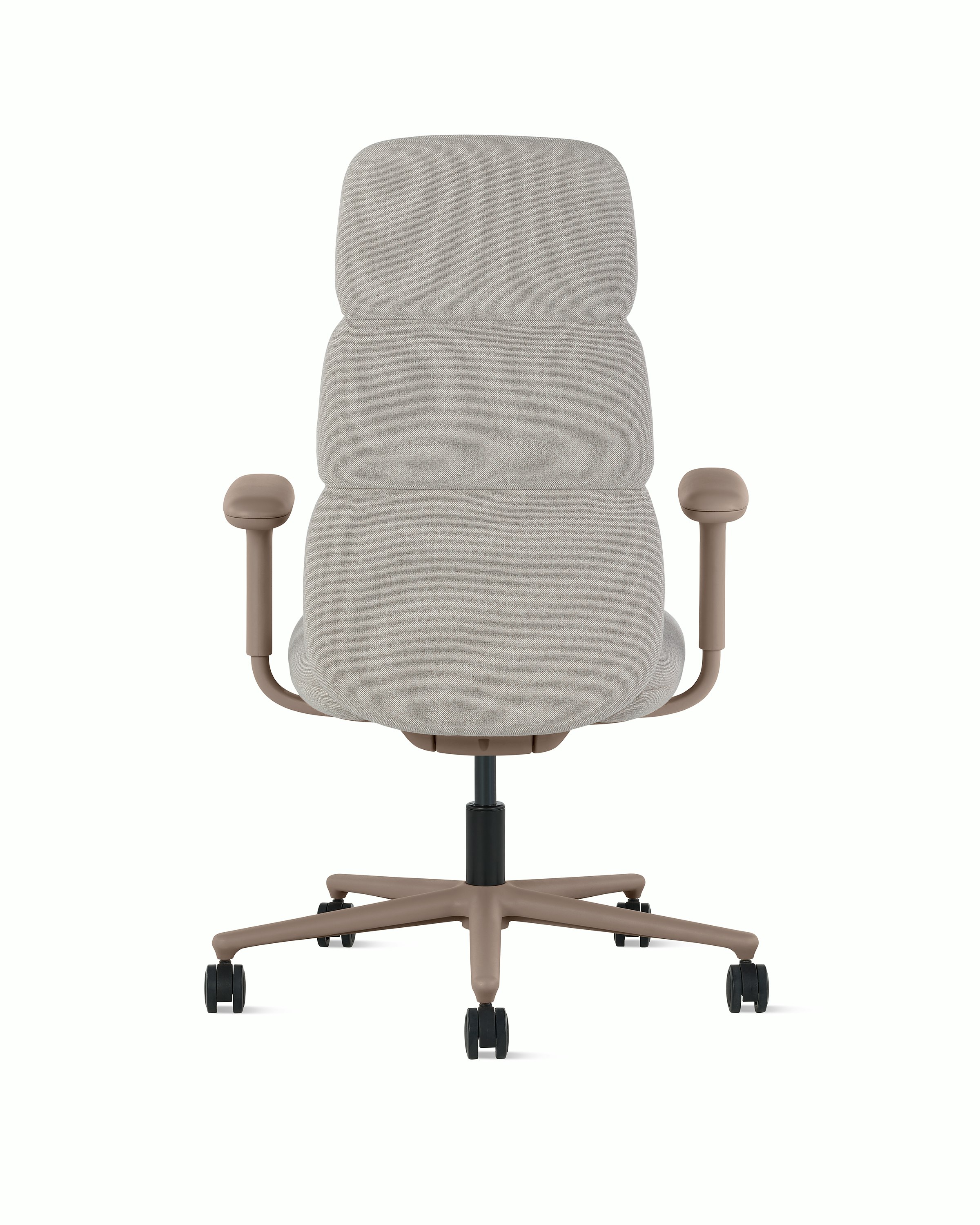 Rear view of a high-back Asari chair by Herman Miller in light brown with height adjustable arms.