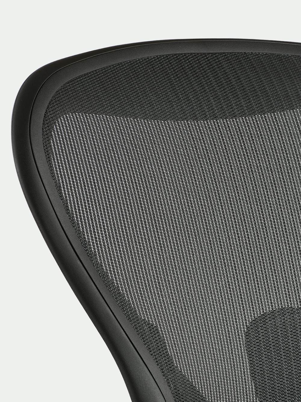 Black matte Aeron Chair on a white background with detailed front view of the front of the chair.