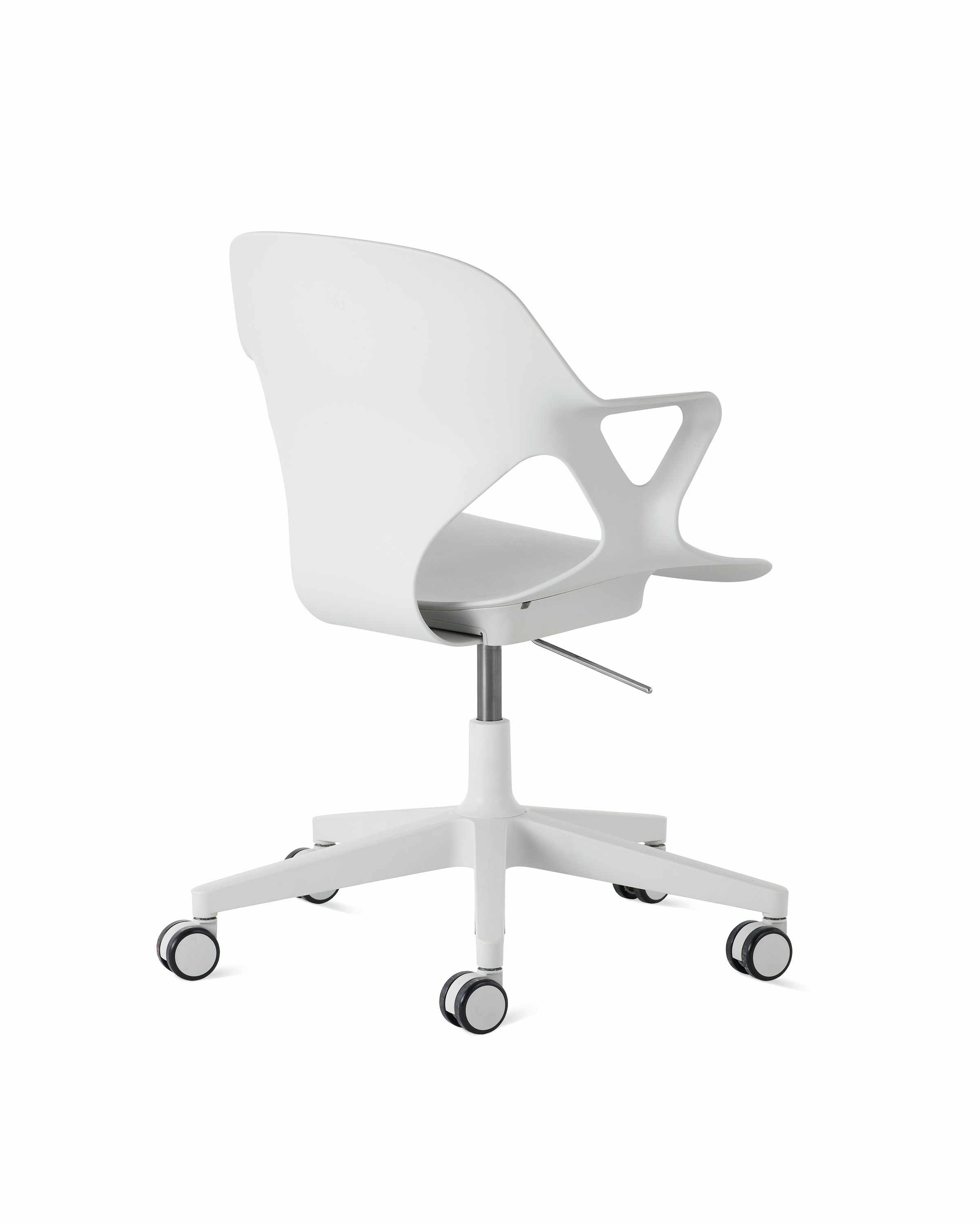 Rear angle view of a Zeph chair with fixed arms in light grey.