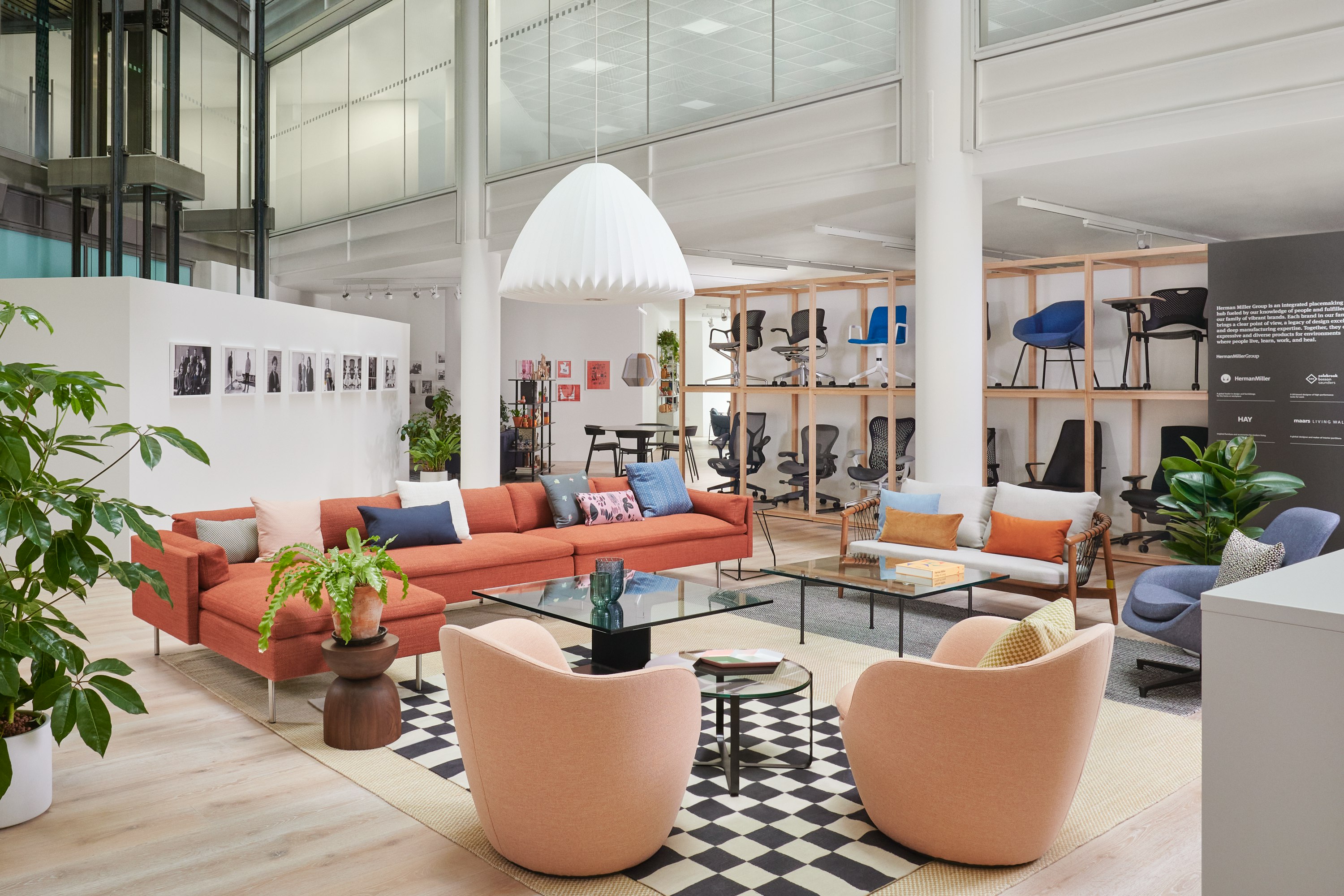 Collection of lounge seating and coffee tables in front of a seating display.