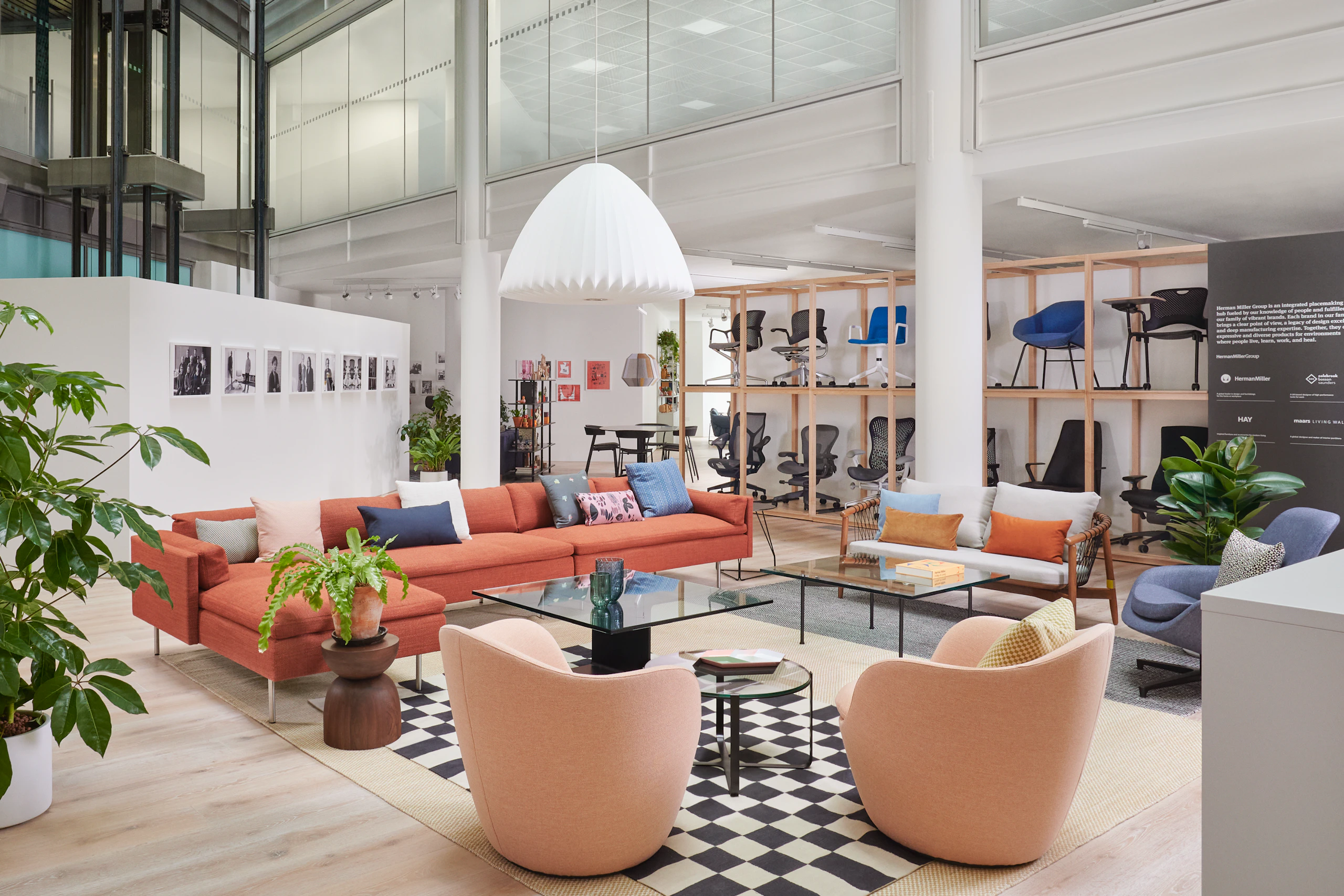 Collection of lounge seating and coffee tables in front of a seating display.