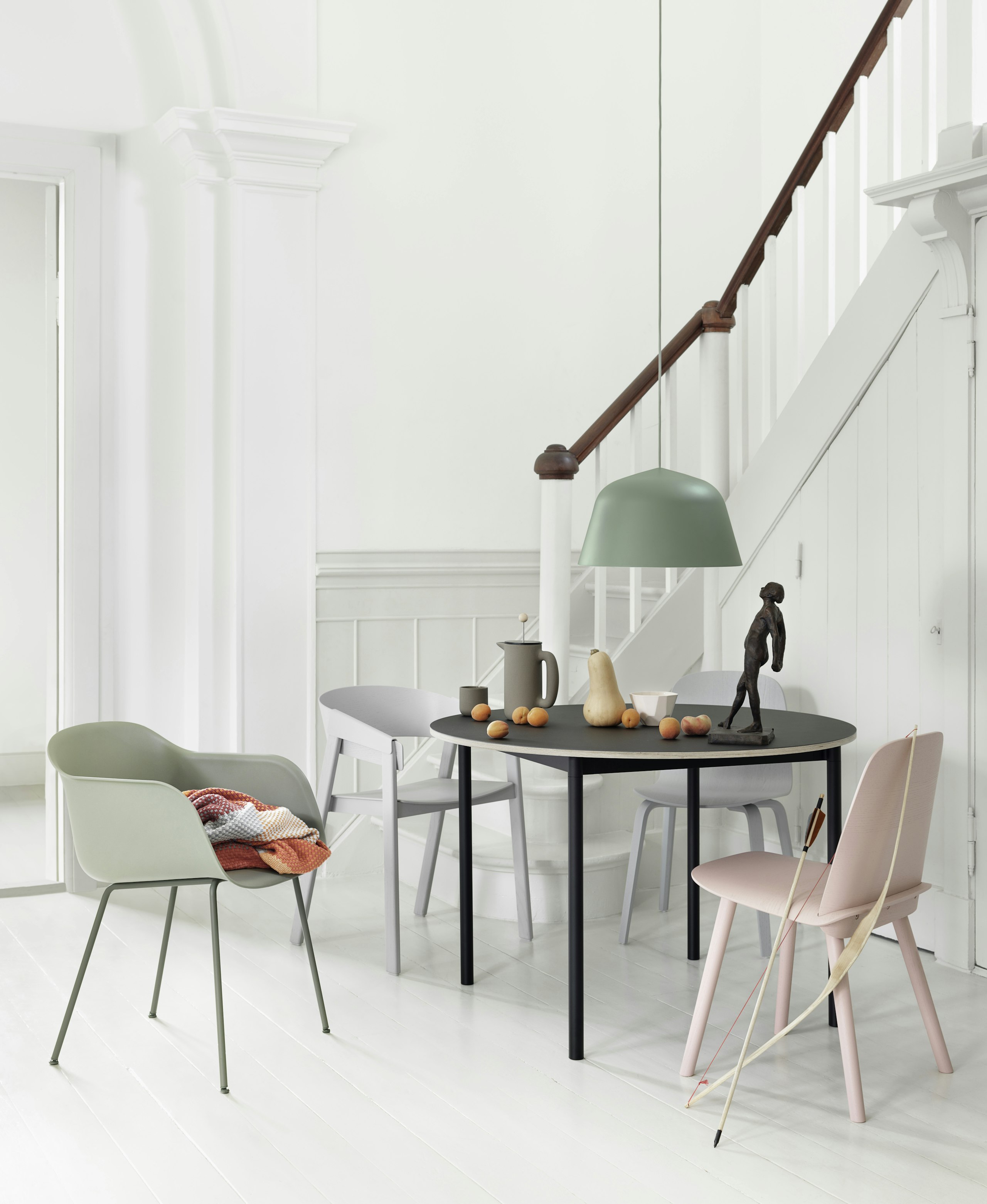 Fiber Armchair - Dusty Green. Nerd Chair - Rose. Cover Chair - Grey. Base Table Round - Black Linoleum/Plywood/Black. Ambit Pendant Lamp - Dusty Green.