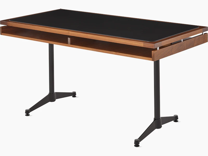 Eames 2500 Series Executive Desk, angled view of walnut and black leather finishes.