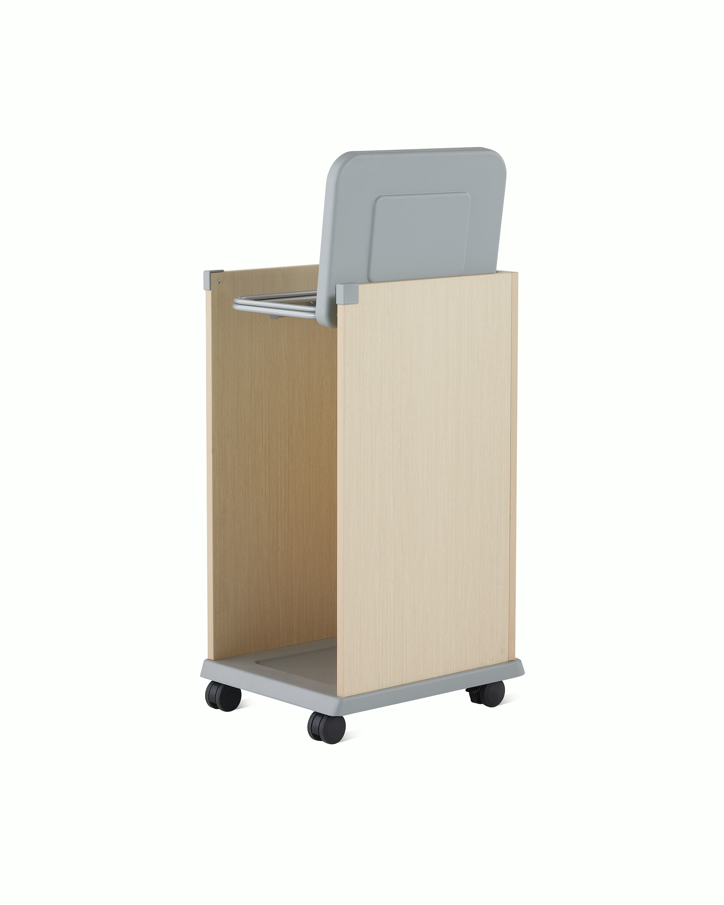 Three-quarter, back view of a Mora casework linen cart in a light ash finish with the lid open.