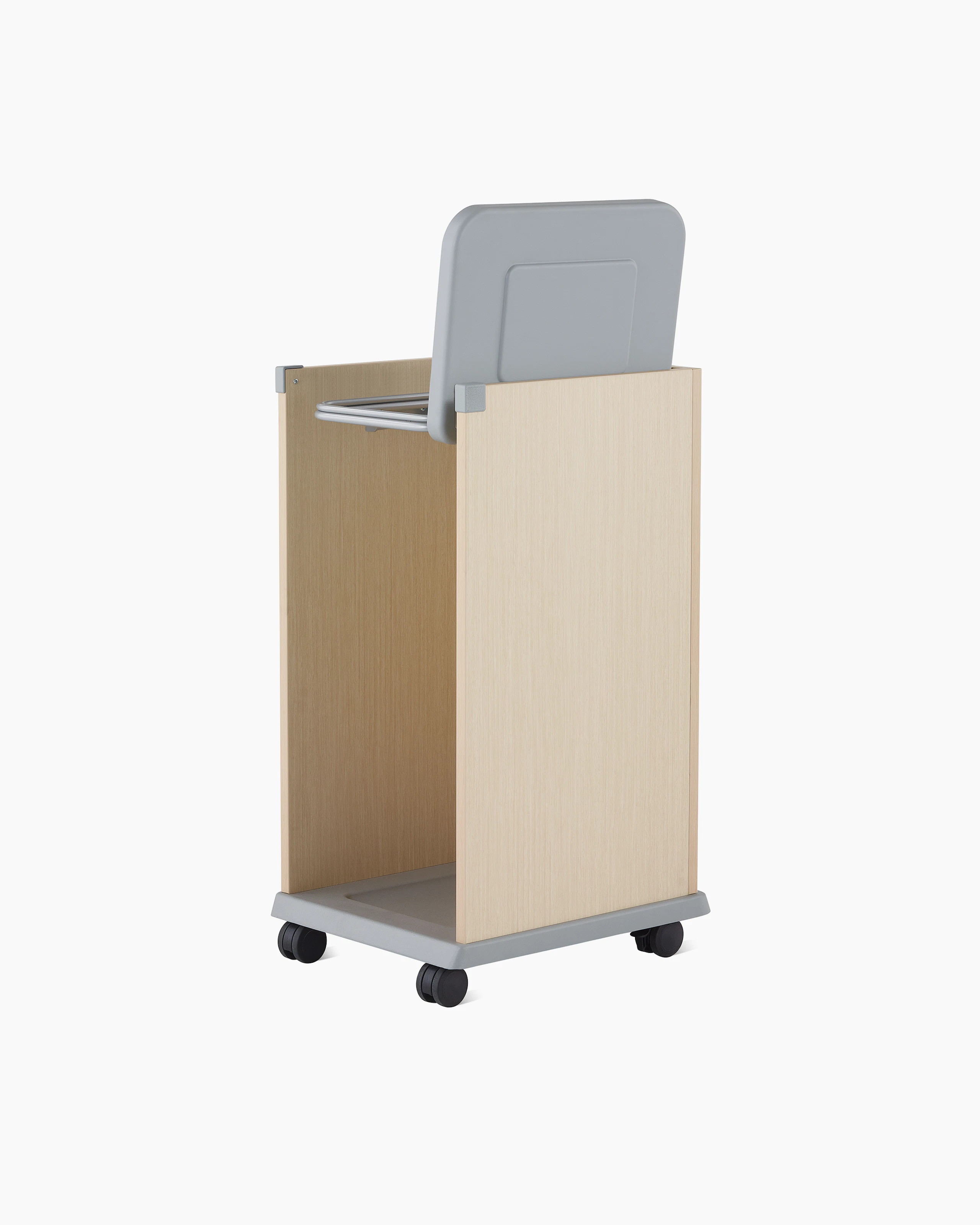 Three-quarter, back view of a Mora casework linen cart in a light ash finish with the lid open.