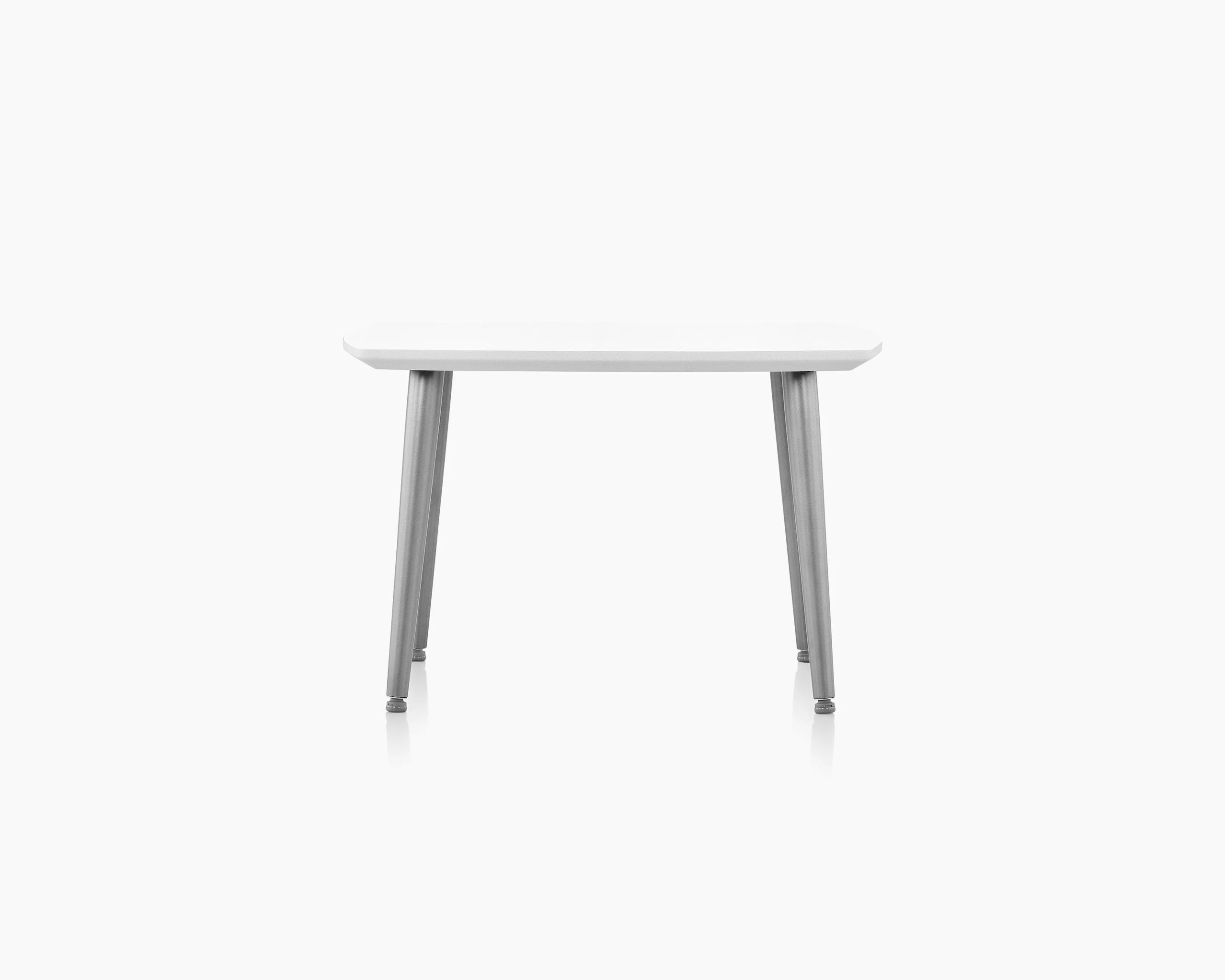 Palisade Occasional Table with metal legs and solid surface top on white sweep.