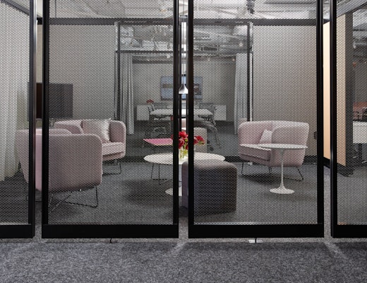 Rockwell Unscripted neocon showroom 2017 rockwell unscripted immersive planning club chairs creative wall with aperature and enclosure saarinen coffee table adaptive planning
