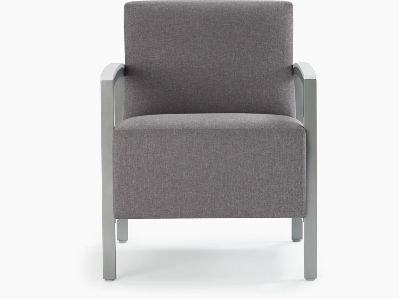 Front view of a gray Brava Modern Lounge Seating chair with solid surface arm caps.