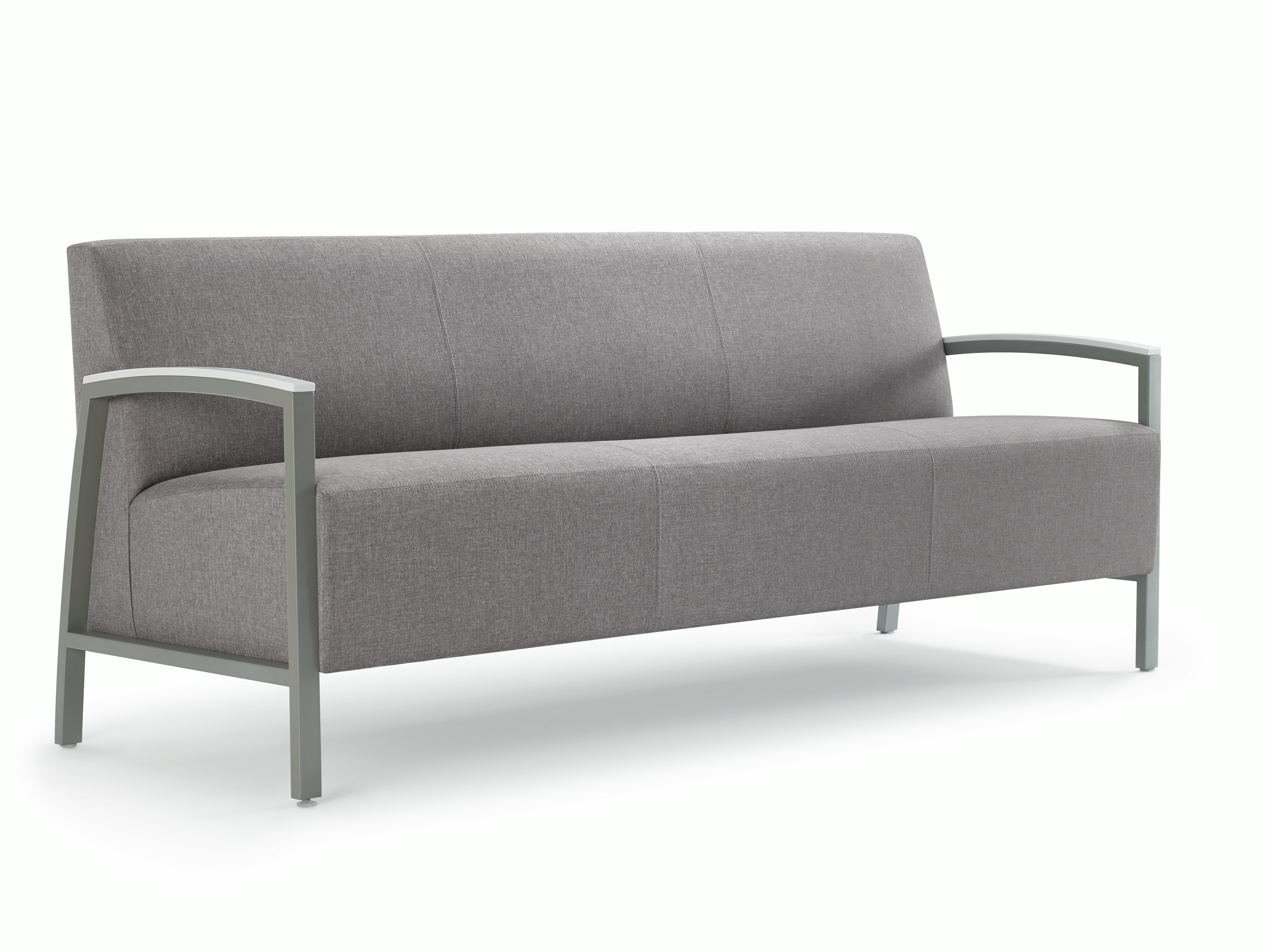 Front three-quarter view of a gray Brava Modern Lounge Seating sofa with solid surface arm caps.