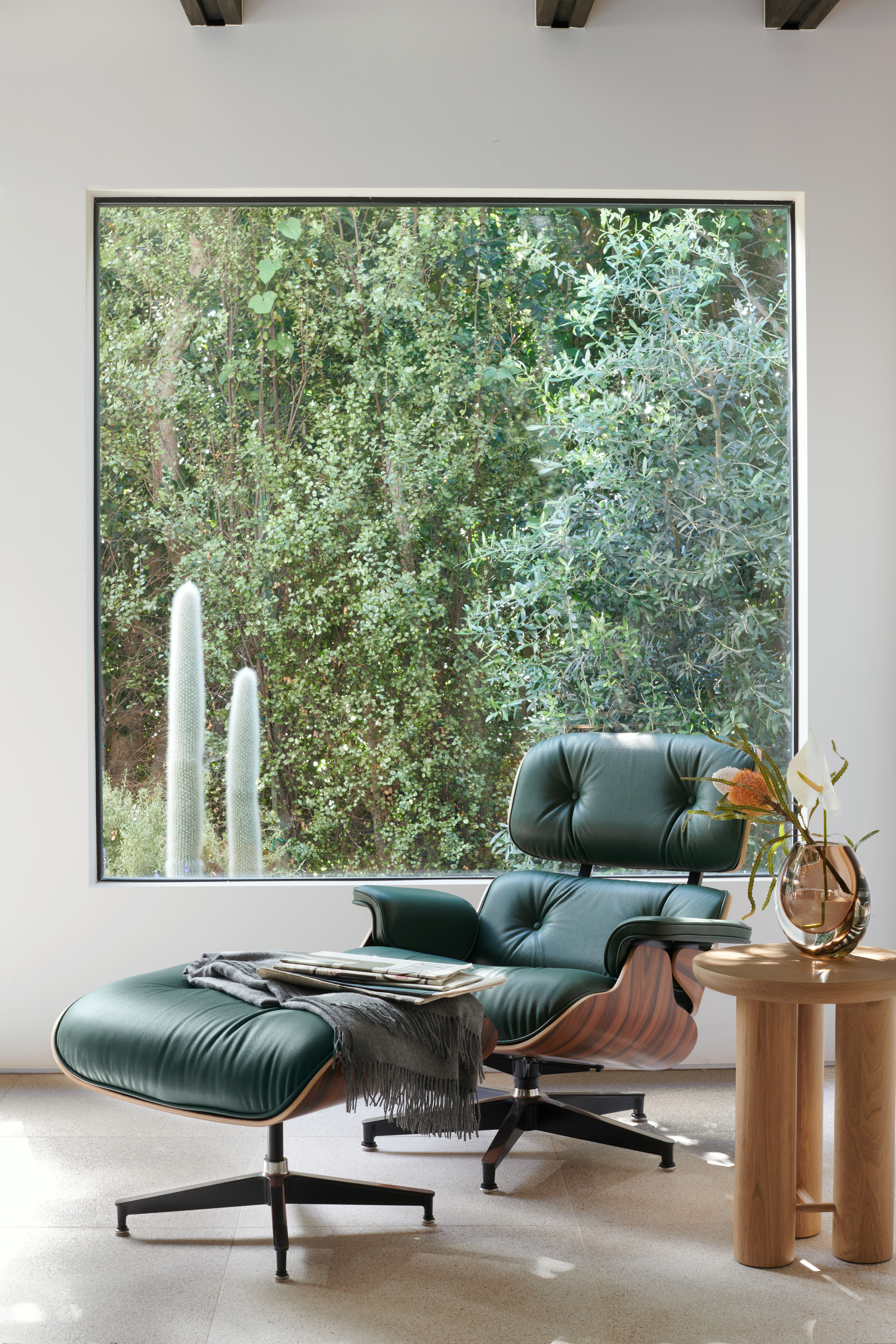 Eames Lounge Chair and Ottoman and Antropologia Side Table