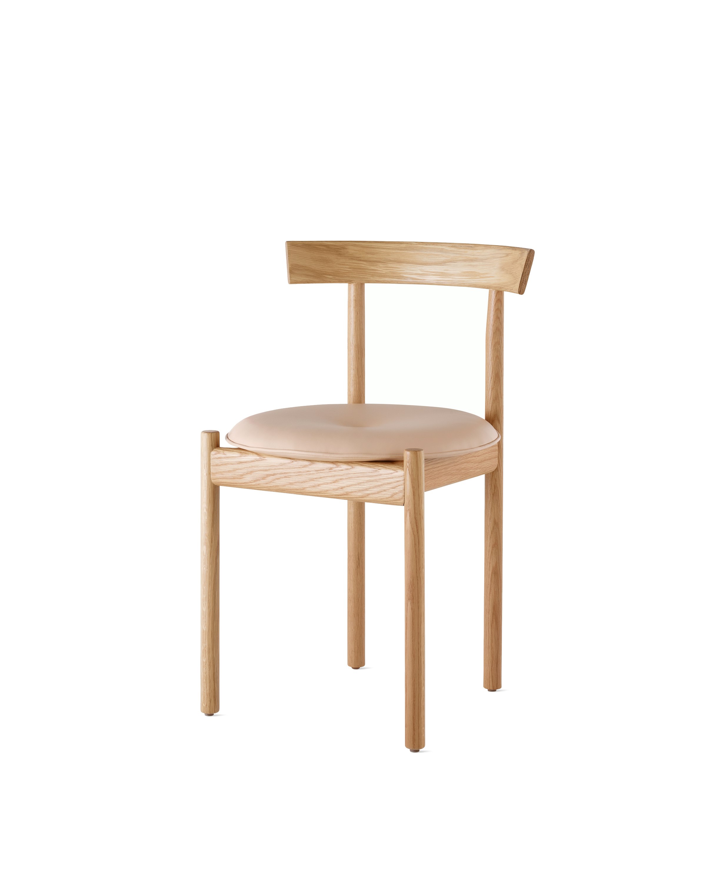 An oak Comma Chair with a seat pad, viewed from the front at an angle.