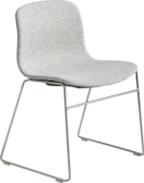 A front angle view of the About A Chair upholstered with a sled base.