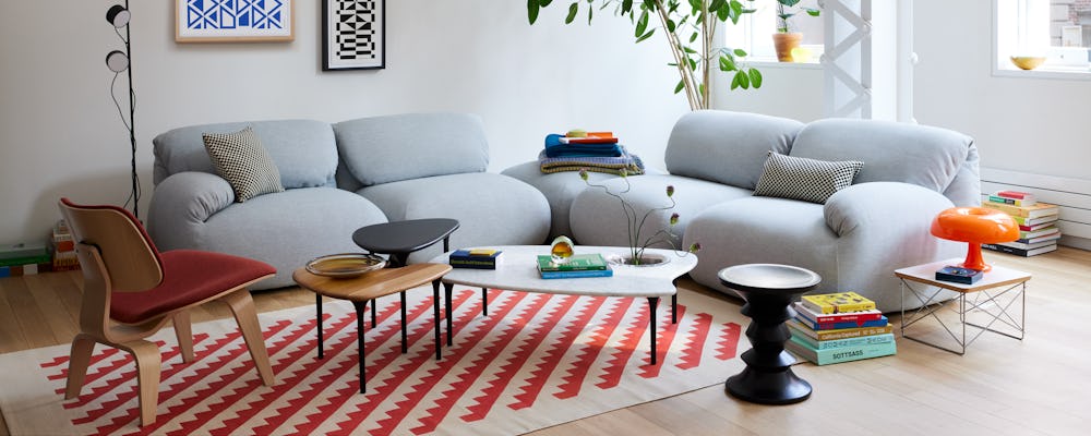 Luva Modular Corner Sectional, Cyclade Tables and Eames Turned Stool