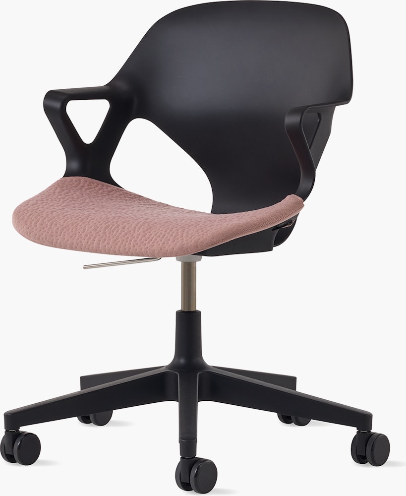 Front angle view of a black Zeph chair with fixed arms and a pink seat pad.