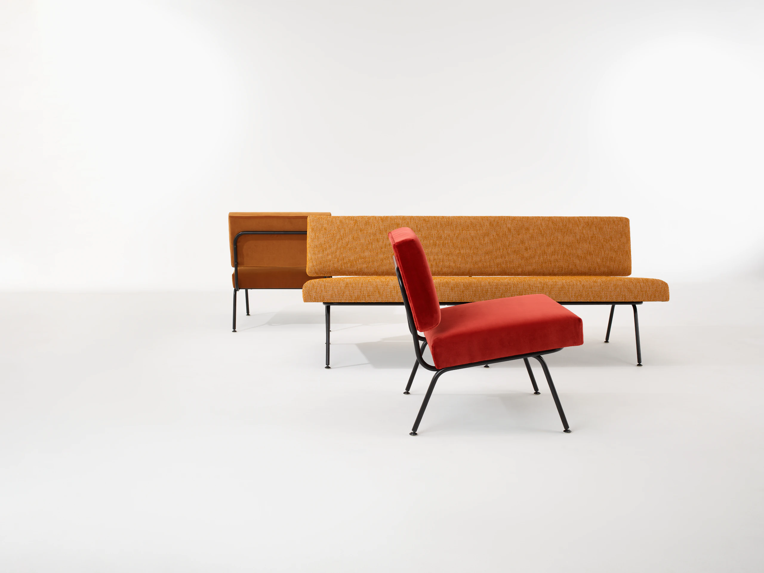 A family shot of a Model 31 lounge chair and a Model 33 sofa.