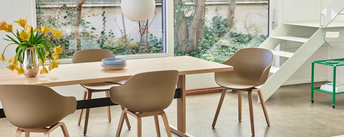 Four AAC 222 Armchairs around a Dulwich Extension Table in a dining room setting