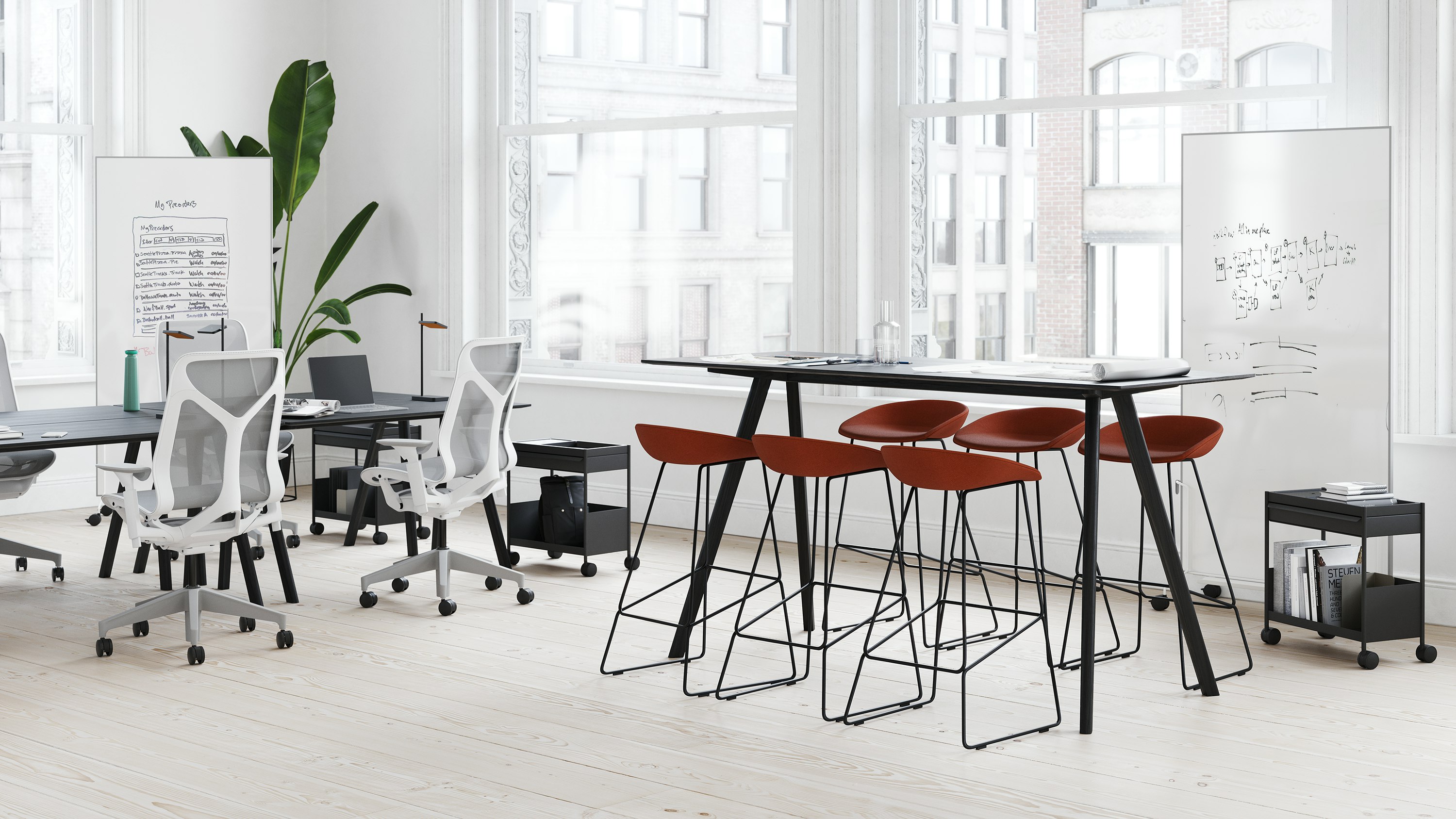 A small business office with one setting that supports individual work with HAY Copenhague Desks and Cosm Chairs and the other setting supporting collaborative work with HAY About A Stools around a Copenhague Table.