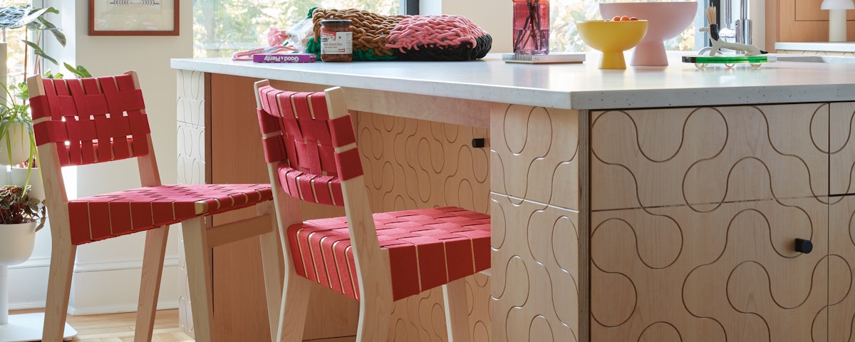 Two Risom Counter Stools at a kitchen counter